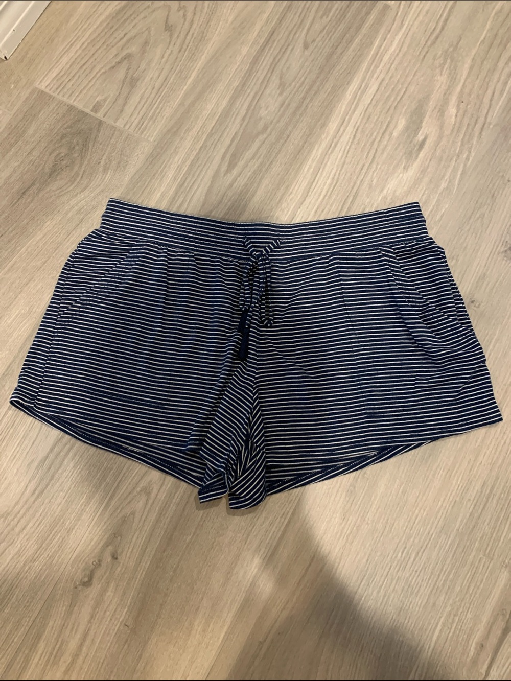 stars above Navy and White Striped Athletic Shorts